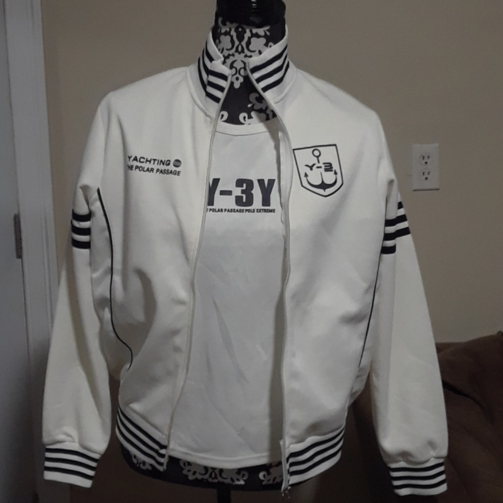 New White sports jacket and white t-shirt.